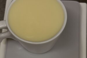 quanto pesa uma xícara de leite condensado em gramas